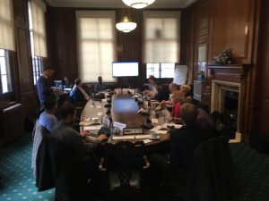 Attendees sit around a large table at the Camden user group 2018