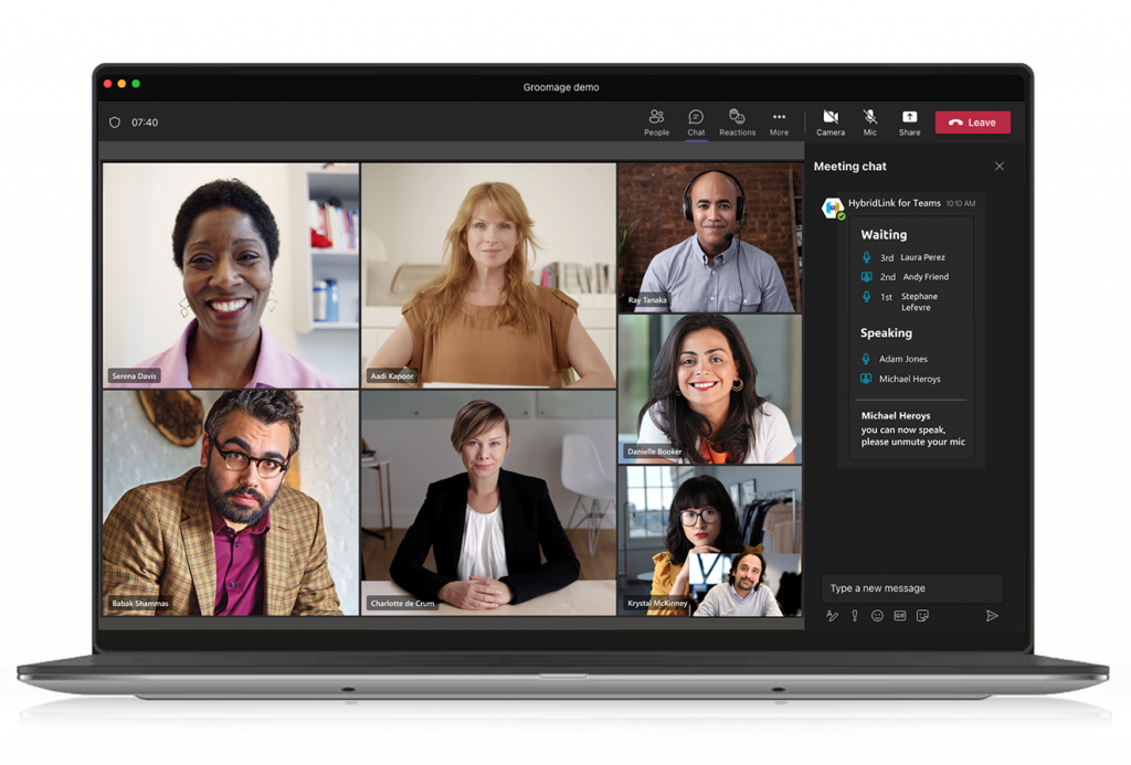 Laptop-Participant-Teams-speakers Laptop of a video conference in Microsoft Teams and HybridLink for Teams bot