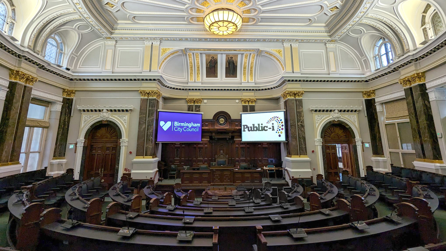 Birmingham chamber installation with logos on displays