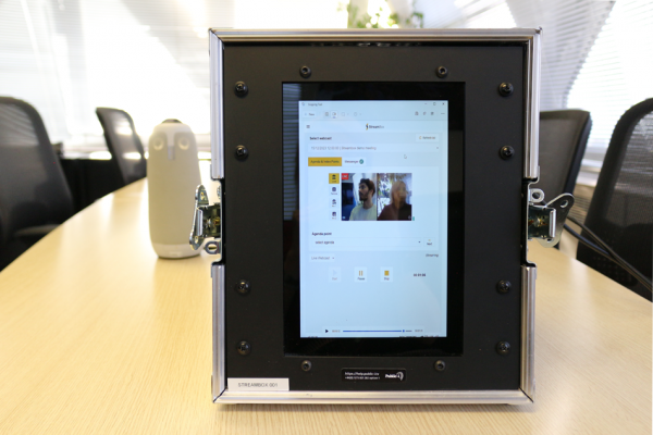 Stream Box front with 10" touchscreen on and the Owl camera behind